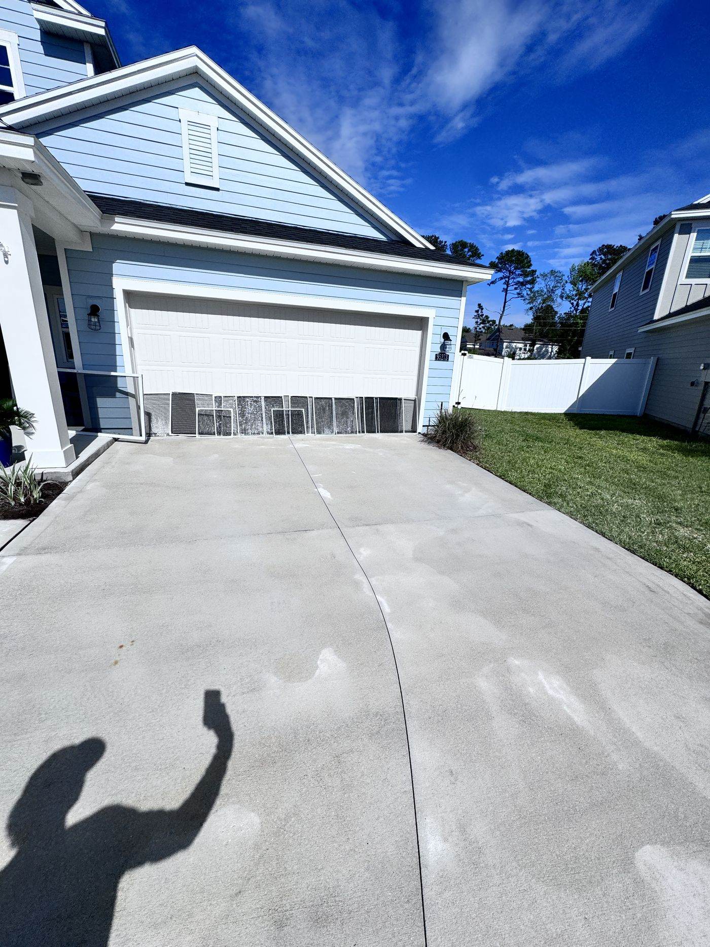 Dirty stained driveway before pressure washing